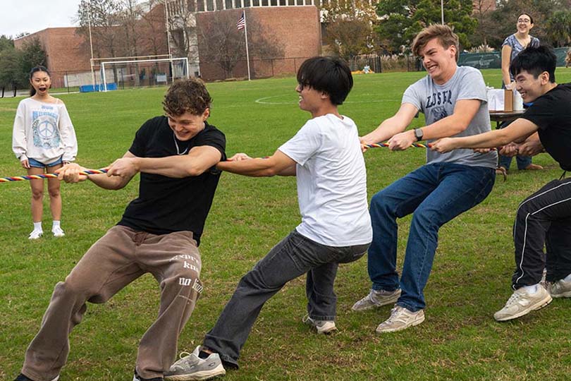 Students competing in tug of war